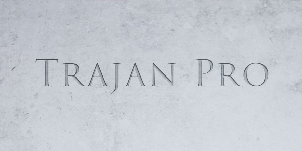 Trajan pro font on marble background